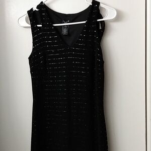 Black dressy dress size 4, double strap unlined except for chest, stretch sequin